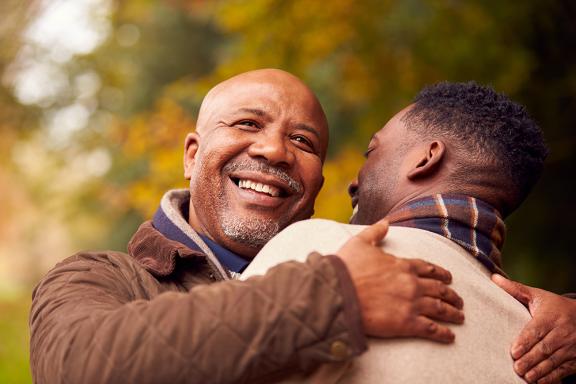 Two men embracing
