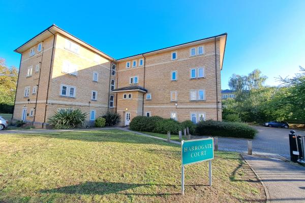 A 4-storey yellow-brick block of flats 